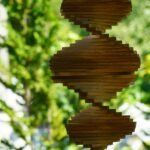 brown wooden round ornament in close up photography